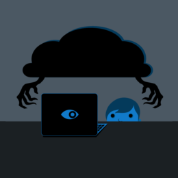 A small head peering over a table at a laptop with scary arms moving in to computer